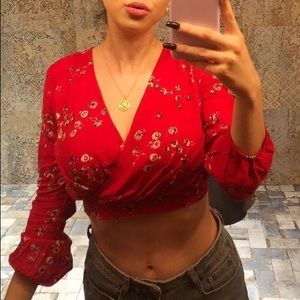 red floral wrap top